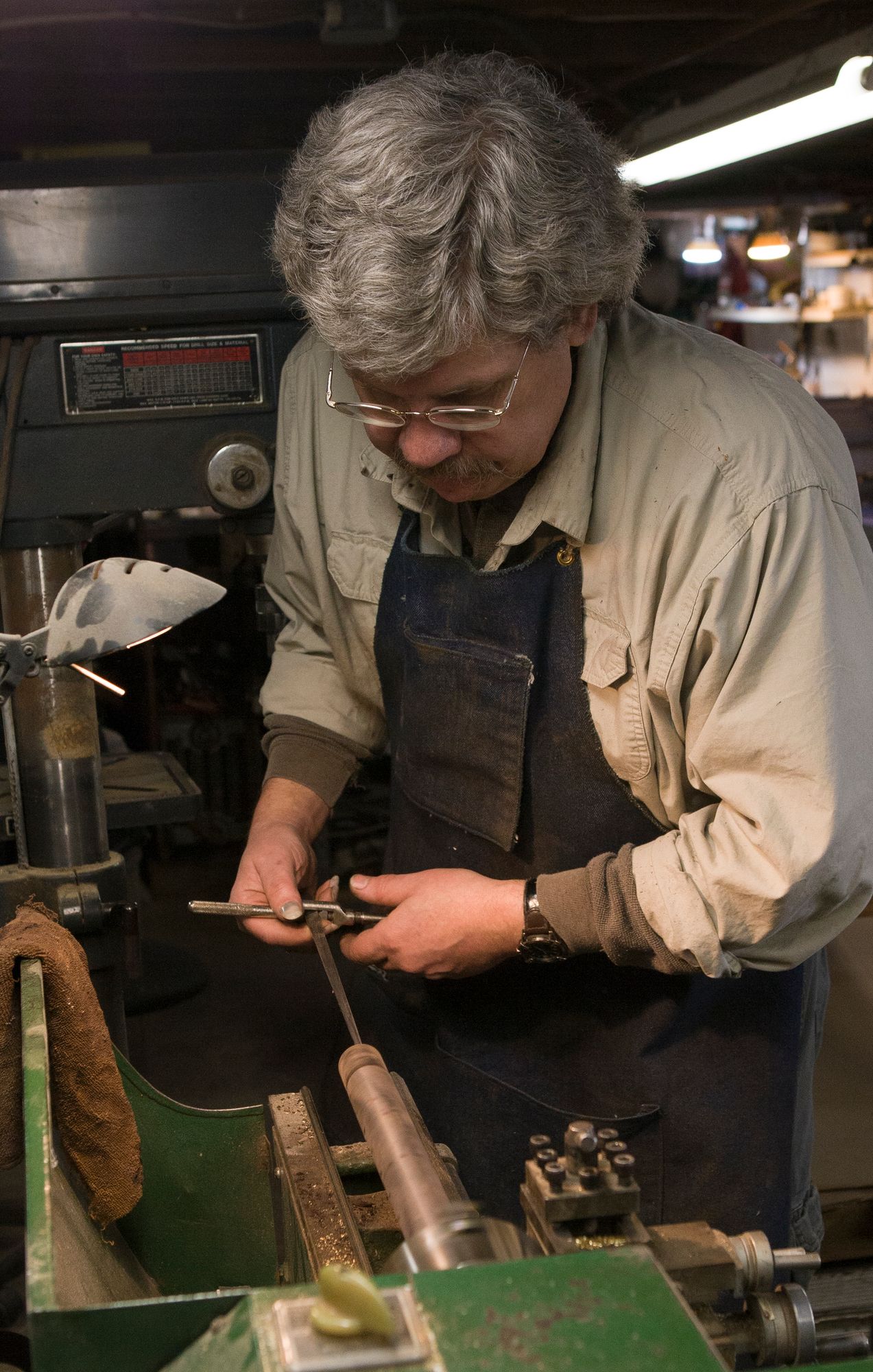 Bruce Childress at work in his Kennebunk workshop
